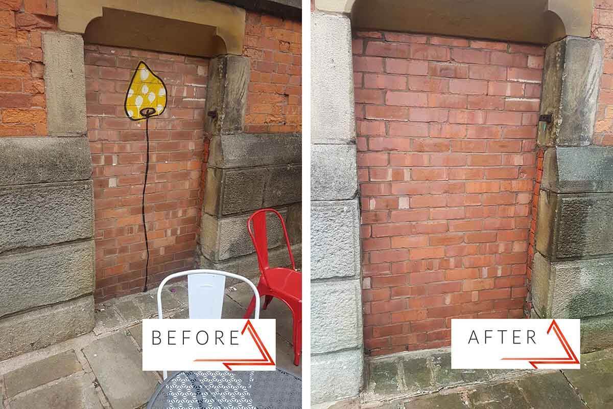 artwork paint removal service from brickwork seating area